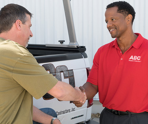 Branch manager shaking customer's hand