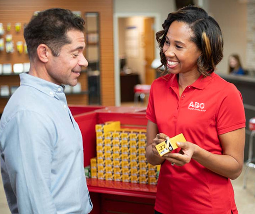 ABC Supply Interiors Manager Candidate in Training speaking with customer